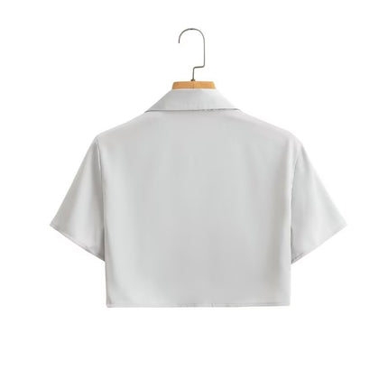 Wholesale Women's Spring Pullover V-neck Short-sleeved Top Mid-length Skirt Suit