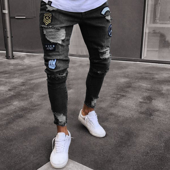 Wholesale Men's Ripped Zipper Emblem Skinny Jeans