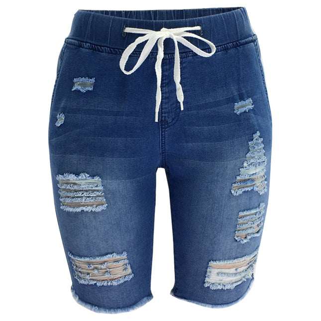 Frühlingszerrissene, hochelastische, mittelhohe Jeans mit mittlerer Taille