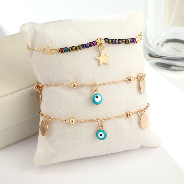 Creative Simple Rice Bead Alloy Round Eyes Stars Multilayer Anklet