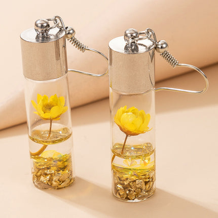Flores secas de plantas Botella de vidrio Pendientes de flores Pendientes de joyería hechos a mano
