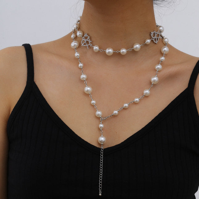 Collar de perlas simple de moda Collar de corazón de diamantes de imitación huecos