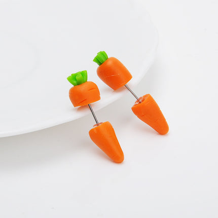 Pendientes de arcilla blanda hechos a mano con zanahoria de dibujos animados
