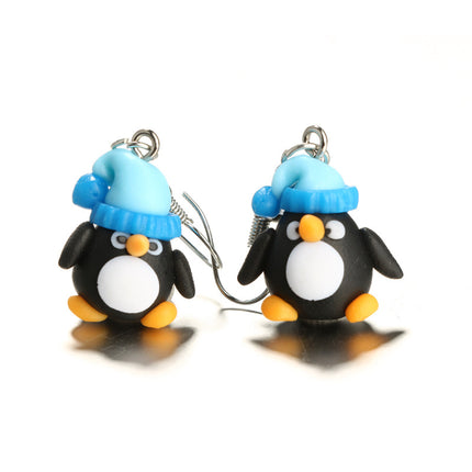 Pendientes creativos de cerámica blanda con el pequeño pingüino