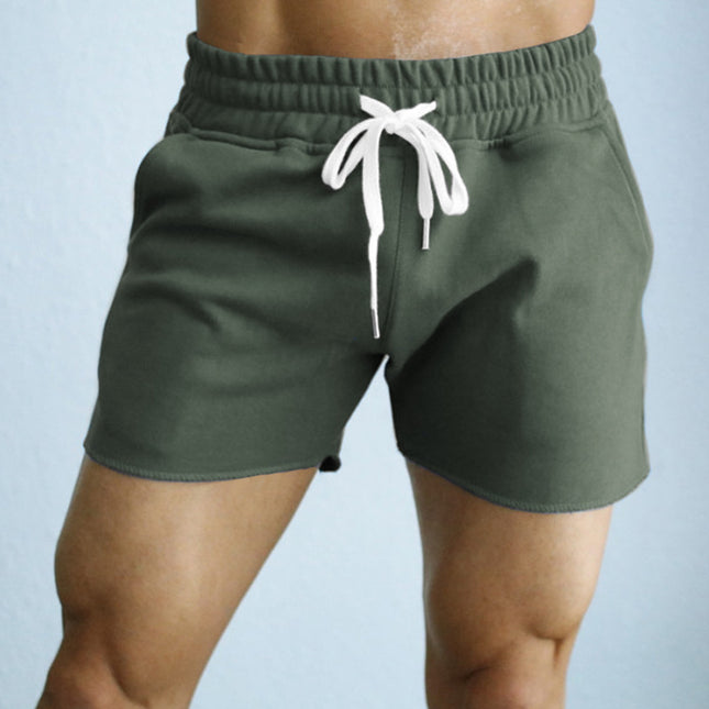 Pantalones cortos casuales con cordón de punto de color sólido deportivo de verano para hombres