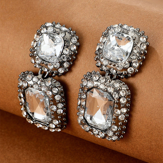 Aretes geométricos con diamantes de imitación engarzados con gemas falsas