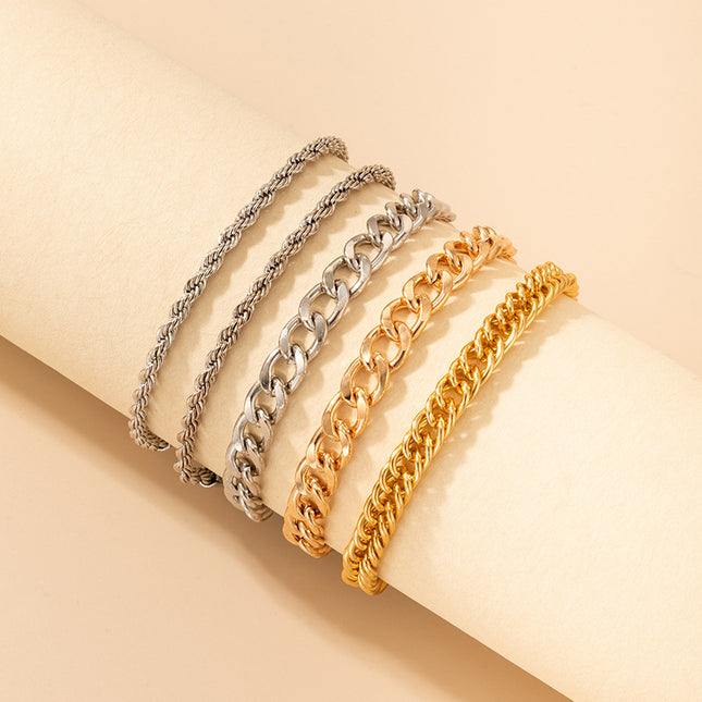 Cinco pulseras simples geométricas mixtas de oro y plata
