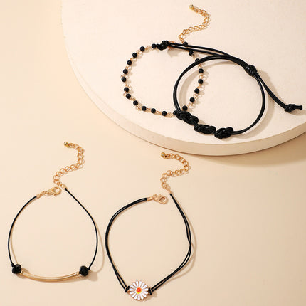 String Daisy Beads Vierstufiges Armband-Set mit Perlen