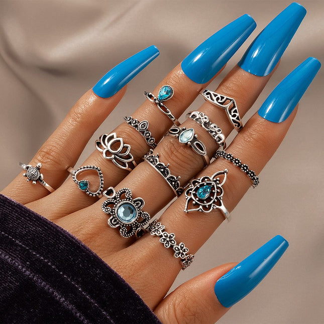 Conjunto de 13 piezas de anillo de elefante con corazón de melocotón y diamantes de corona de loto hueco de moda vintage