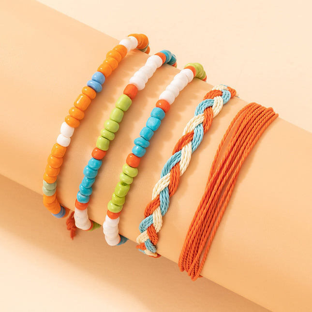 Juego de pulseras de cuerda trenzada con cuentas de colores de cinco pulseras trenzadas de cuentas de arroz de estilo étnico