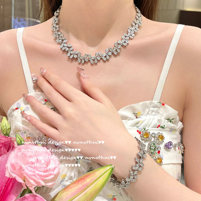 Großhandel 18 Karat Gold überzogen Rattan Zirkon Blütenblatt Halskette Armband Set