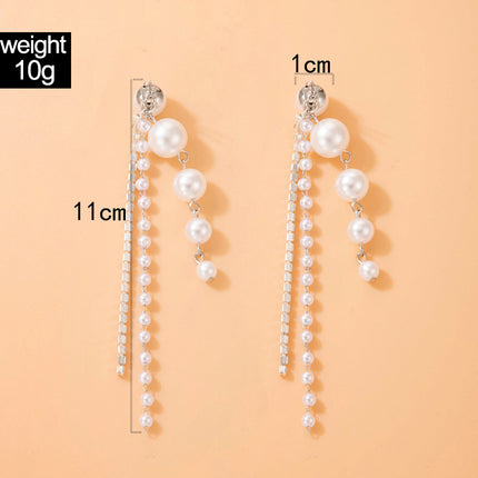 Perlenketten-wulstige Ohrstecker Geometrische Strass-Licht-Luxus-Ohrringe