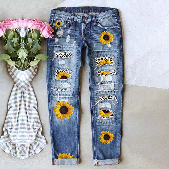 Zerrissene Damen-Sonnenblumen-Leoparden-Jeans mit mittlerer Taille