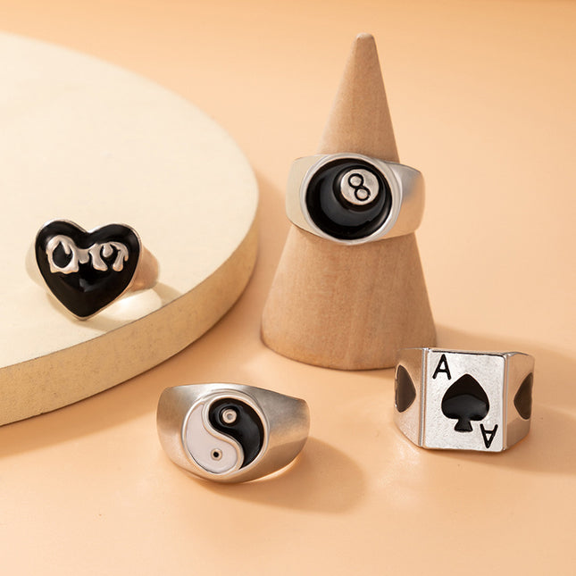 Peach Heart Drip Oil Ring Set aus vier schwarzen und weißen Tai Chi Ringen