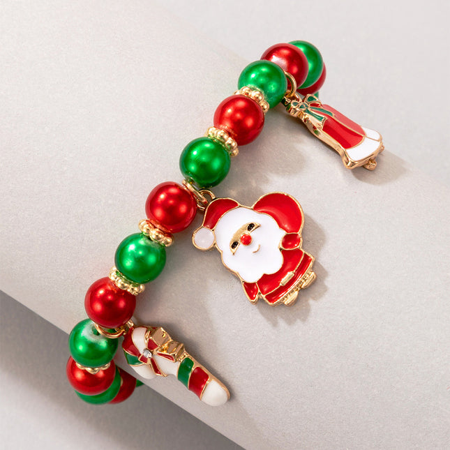 Pulsera de perlas de color con campana de Papá Noel