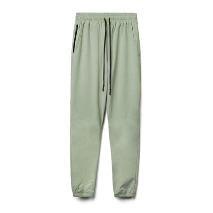 Pantalones de secado rápido ajustables de pie suelto casual para hombres de primavera otoño