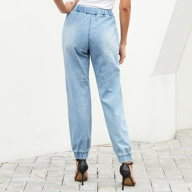 Jeans lavados de talle alto con cordón en la cintura