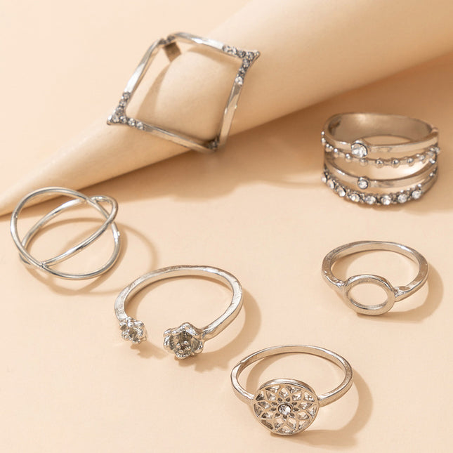 Juego de anillos de 6 piezas con forma de flor plateada y diamantes de imitación a la moda