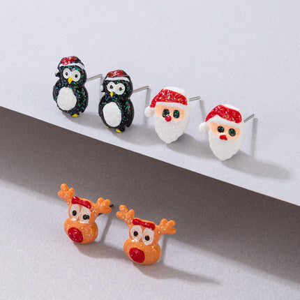 Conjunto de aretes de perno prisionero de Papá Noel de alce de pingüino de dibujos animados