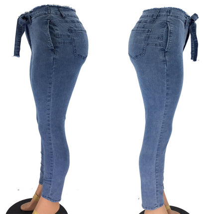 Wholesale Women's Mid Rise Slim Waist Tassel Belt Skinny Jeans