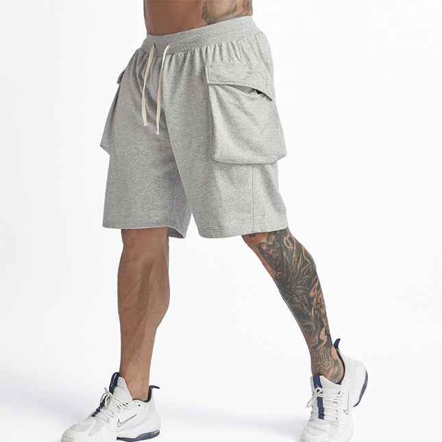 Pantalones cortos sueltos de color sólido de gran tamaño para hombres de verano