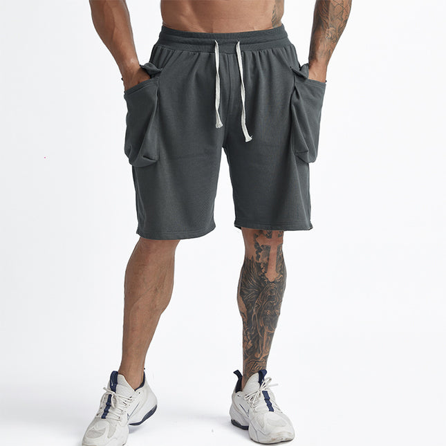 Pantalones cortos sueltos de color sólido de gran tamaño para hombres de verano