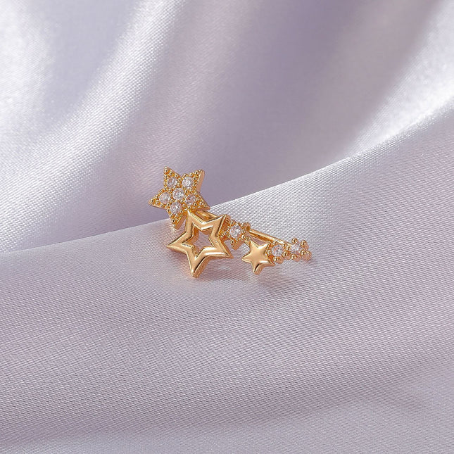 Pendientes de clip de oreja de estrella de diamantes de imitación de circón de moda simple al por mayor