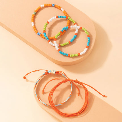 Buntes Perlen-geflochtenes Seil-Armband-Set aus fünf Reisperlen-geflochtenen Armbändern im ethnischen Stil