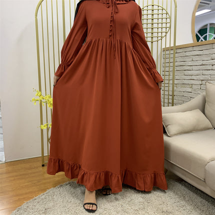 Venta al por mayor vestido musulmán con costuras de color sólido para mujer