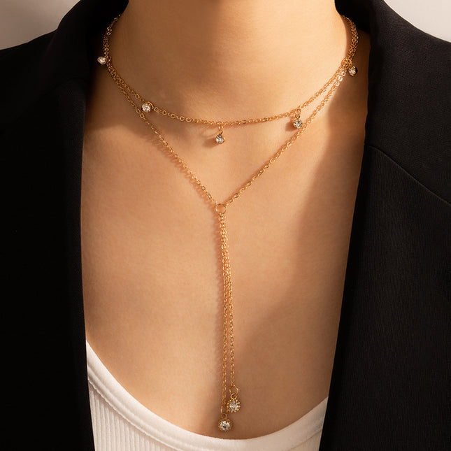 Collar de doble capa de oro con cadena de diamantes de imitación de aleación de moda al por mayor