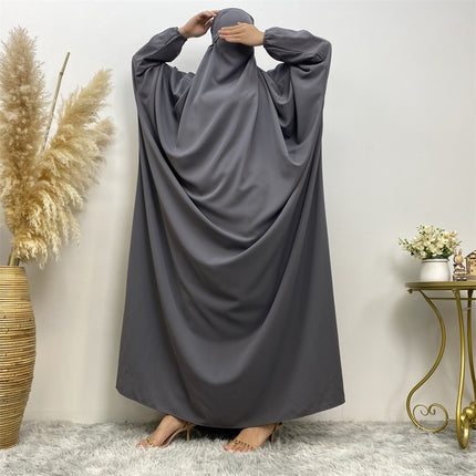 Venta al por mayor Vestido musulmán de color sólido para mujeres de Oriente Medio Dubai