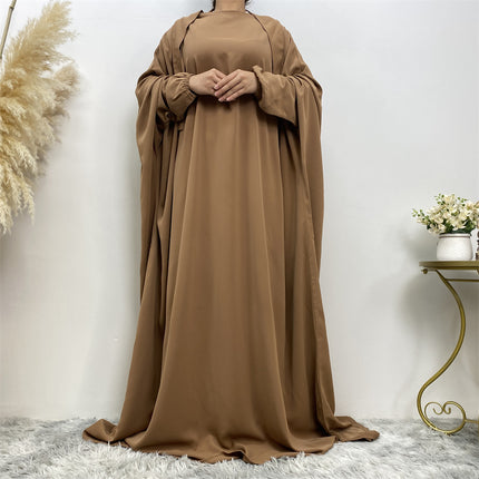 Venta al por mayor Vestido musulmán de color sólido para mujeres de Oriente Medio Dubai